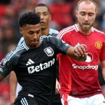 Ollie Watkins berebut bola dengan Christian Eriksen