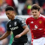 Ollie Watkins mempertahankan bola dari gangguan Harry Maguire