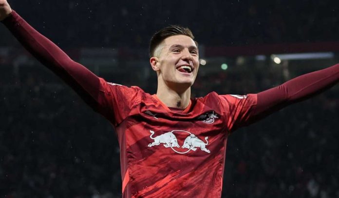 Benjamin Sesko merayakan golnya untuk RB Leipzig