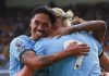Tijjani Reijnders memeluk Erling Haaland dalam selebrasi gol Manchester City