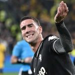 Dusan Vlahovic merayakan golnya ke gawang Borussia Dortmund