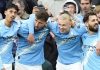 Erling Haaland merayakan gol bersama rekan-rekannya