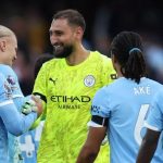 Gianluigi Donnarumma usai melakukan penyelamatan krusial
