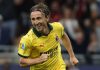 Luka Modric merayakan gol pertamanya untuk AC Milan