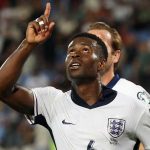 Marc Guehi merayakan gol perdananya untuk Inggris