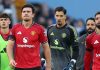 Para pemain Manchester United meninggalkan lapangan usai derbi Manchester