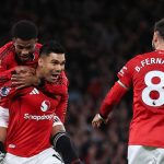 Casemiro merayakan gol bersama Amad Diallo dan Bruno Fernandes