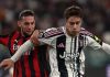 Kenan Yildiz berusaha mempertahankan bola dari Adrien Rabiot