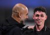Pep Guardiola dan Phil Foden usai laga melawan Huddersfield
