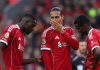 Ibrahima Konate bersama Virgil van Dijk dan Alexander Isak