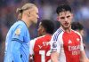 Declan rice berbicara dengan Erling Haaland di laga Arsenal vs Manchester City