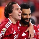 Federico Chiesa dan Mohamed Salah merayakan gol di Liverpool