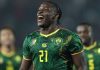 Karl Etta Eyong merayakan gol ke gawang Kamerun di Piala Afrika