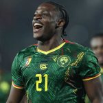 Karl Etta Eyong merayakan gol ke gawang Kamerun di Piala Afrika