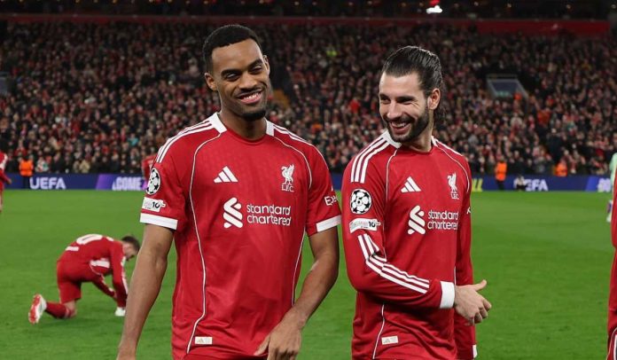 Dominik Szoboszlai berbicara dengan Ryan Gravenberch di laga Liverpool v Qarabag di Champions League