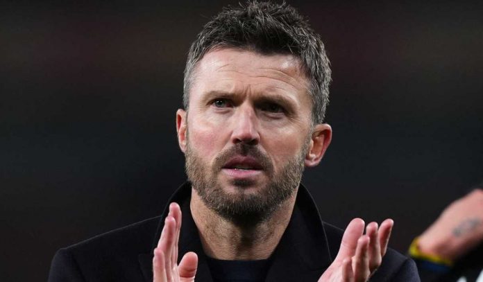 Gestur Michael Carrick di laga Arsenal v Manchester United di Premier League