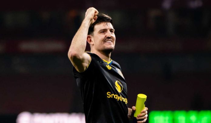 Gestur bahagia Harry Maguire usai kemenangan Manchester United atas Arsenal di Premier League Gestur bahagia Harry Maguire usai kemenangan Manchester United atas Arsenal di Premier League
