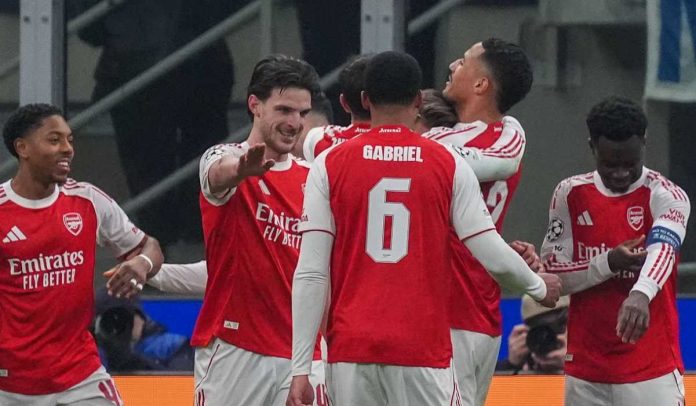Para pemain Arsenal merayakan gol ke gawang Inter Para pemain Arsenal merayakan gol ke gawang Inter