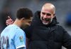 Pep Guardiola menyambut Rico Lewis dengan bahagia usai laga Newcastle vs Manchester City di Carabao Cup