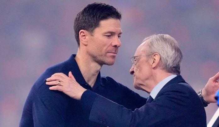 Xabi Alonso berpelukan dengan FLorentino Perez Xabi Alonso berpelukan dengan FLorentino Perez