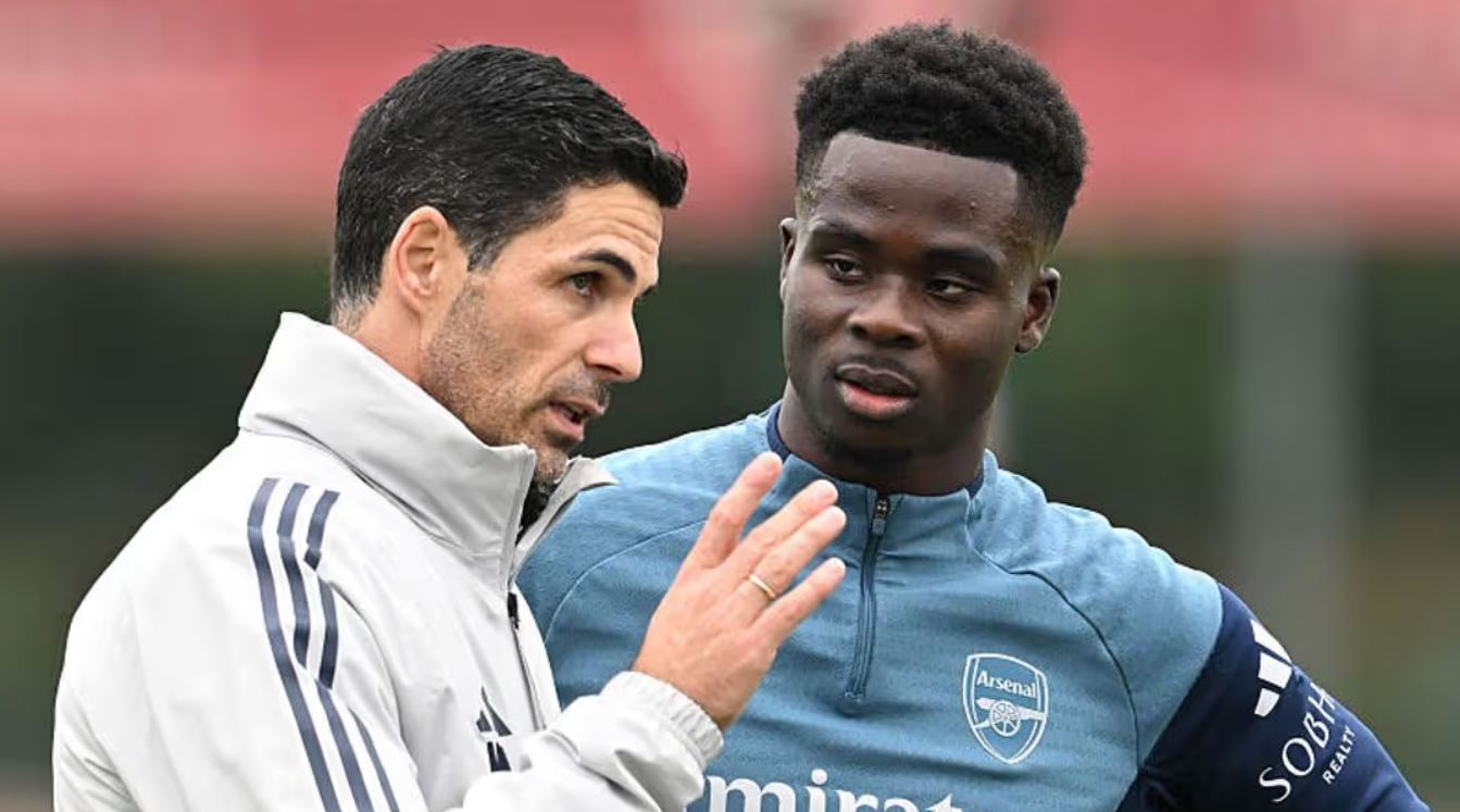 Mikel Arteta dan Bukayo Saka - Arsenal