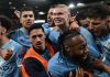 Pemain Manchester City merayakan kemenangan mereka atas Liverpool di Anfield