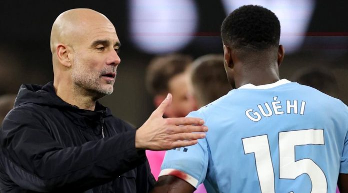 Pep Guardiola dan Marc Guehi