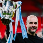 Pep Guardiola dan trofi Carabao Cup atau Piala Liga