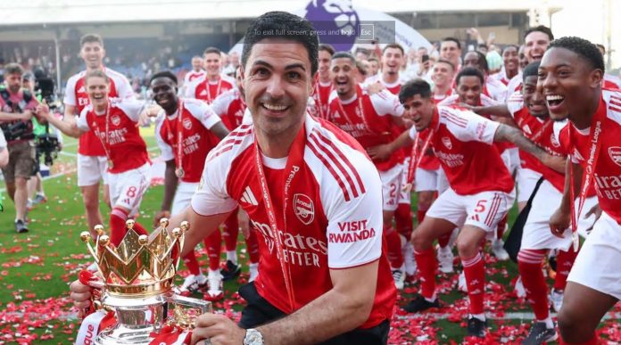 Mikel Arteta dan pemain Arsenal merayakan gelar juara Premier League Mikel Arteta dan pemain Arsenal merayakan gelar juara Premier League