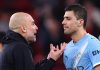 Pep Guardiola dan Rodri pemain Manchester City